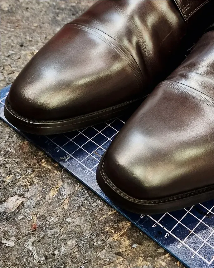 The same shoes restored and polished