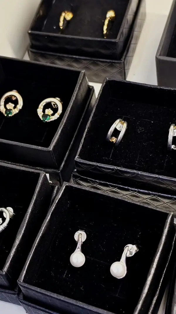 Earrings, including Claddagh studs, in gift boxes