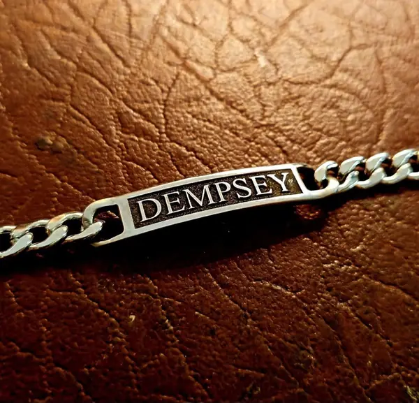 Silver ID bracelet engraved with a name