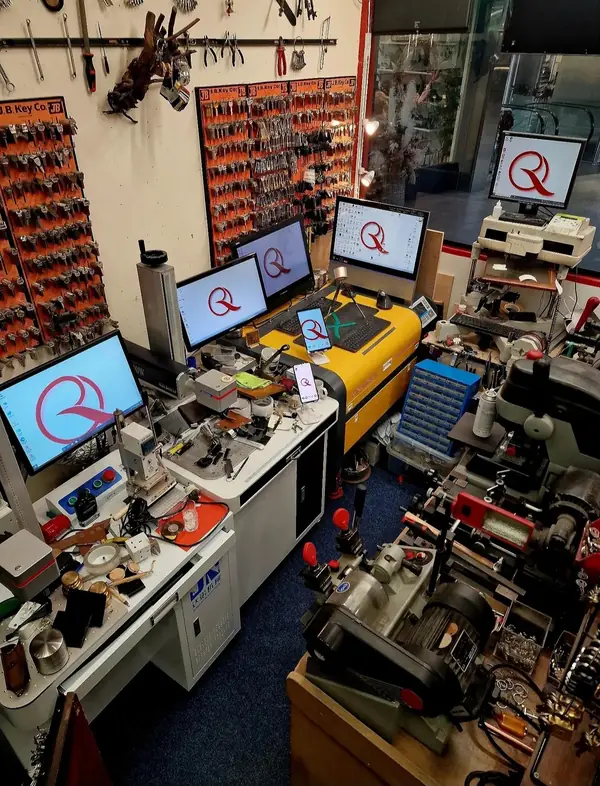 My engraving area, with the laser engravers, key machines and screens