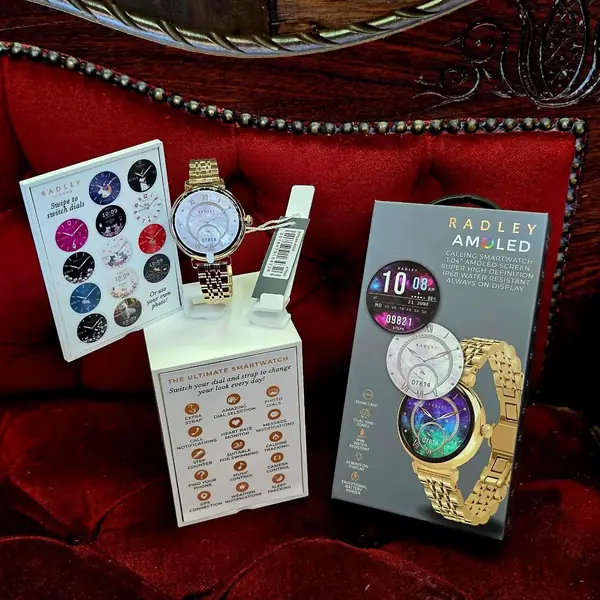 Radley watches and a smartwatch on display in the shop