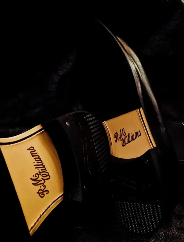 R.M. Williams boots on the bench